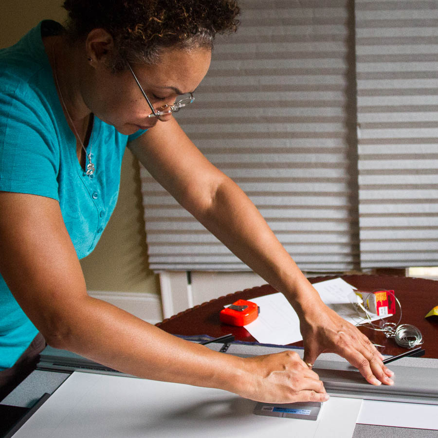 Cutting the mat for the frame | Atlanta Photography Exhibition by Kelley Alexander and Miriam Phields | Sept. 5 - 30, 2014