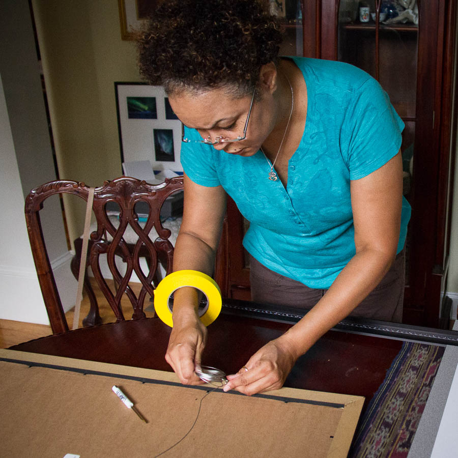 Attaching the framing wire for the Atlanta Photography Exhibition by Kelley Alexander and Miriam Phields | Sept. 5 - 30, 2014